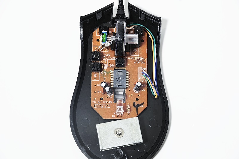 a mouse with electronics attached to it