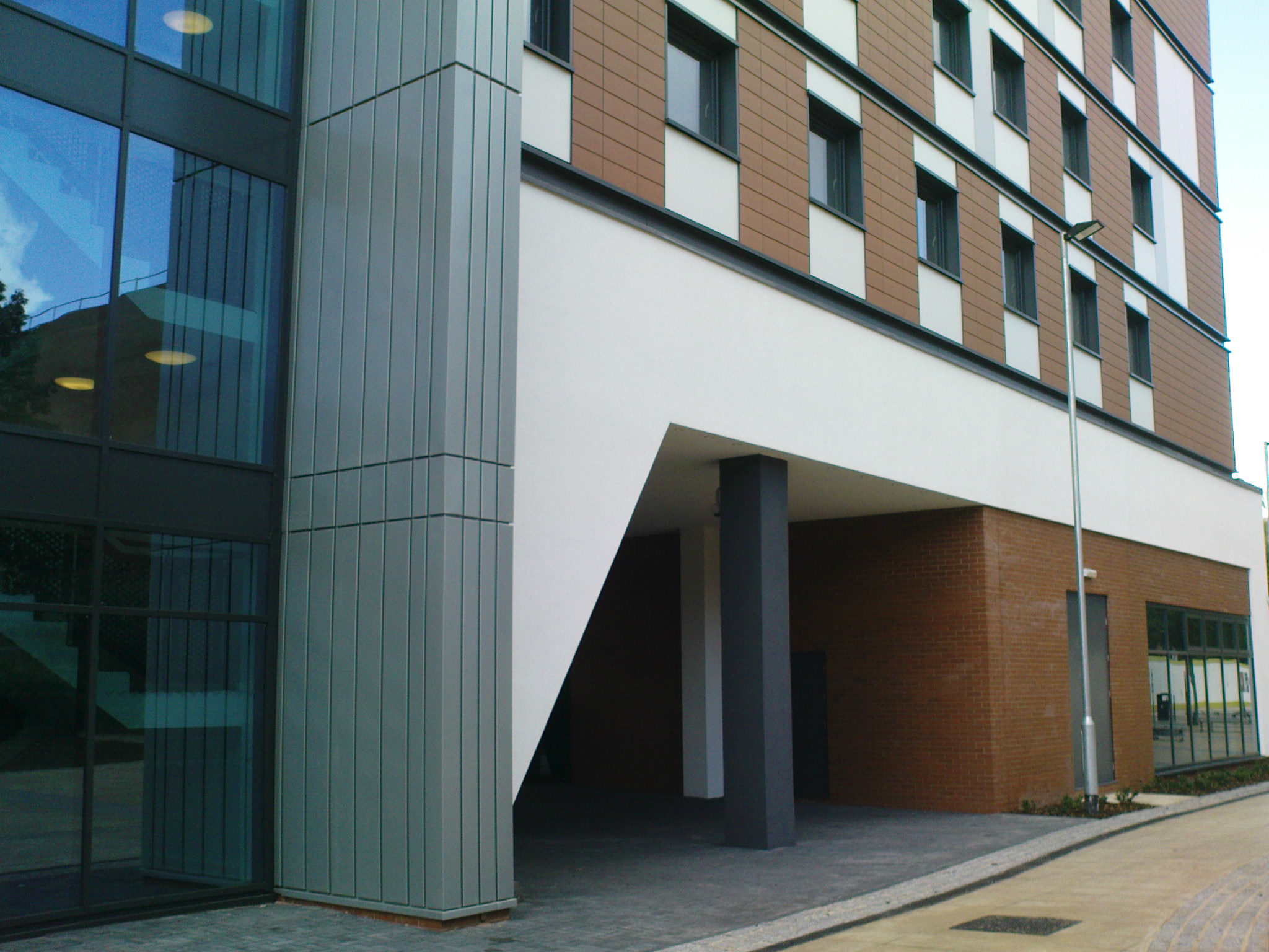 a building with some windows near the side of it