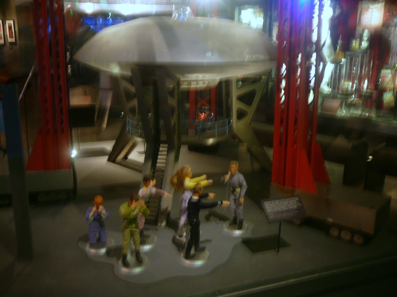 toy figurines on display in front of stage props