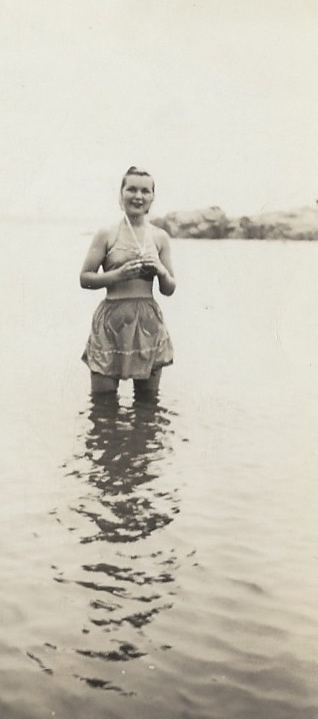 an old picture shows a girl in the water
