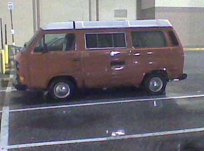 a van that is parked outside in a parking lot
