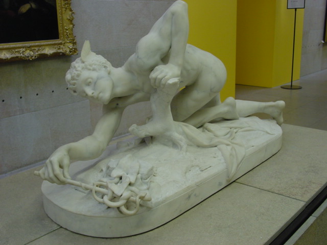 white marble statue of a man falling