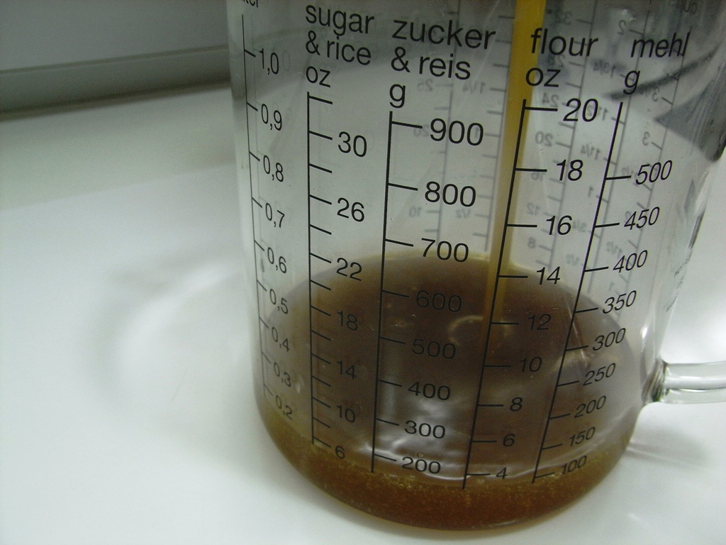 the blender is measuring the contents of sugar and ginger syrup