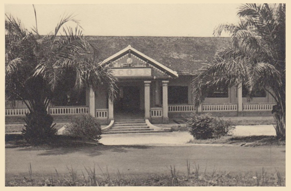 black and white pograph of a house with a porch