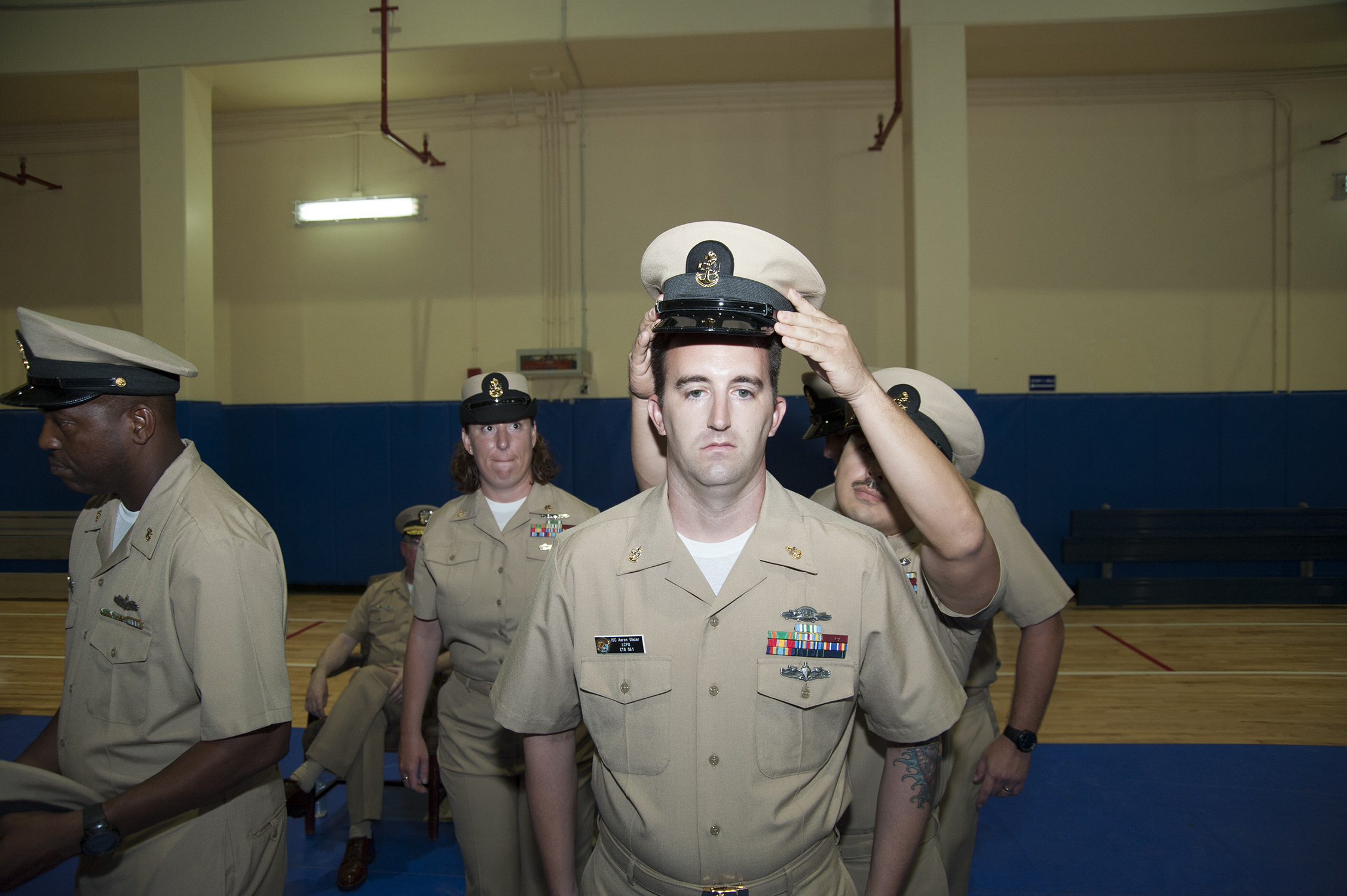 a man is taking a picture of military men