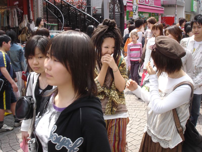 there is a group of young women standing together