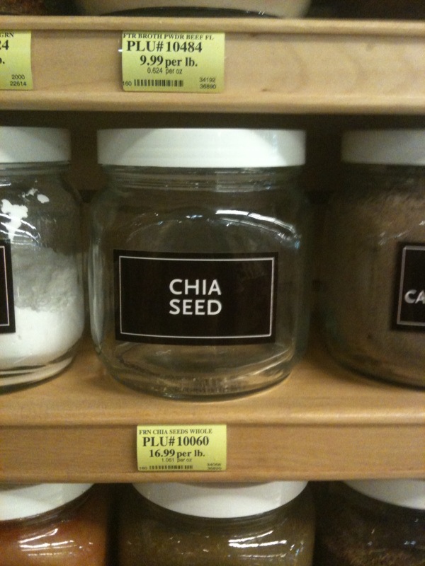 glass jars with labels in a supermarket shelf