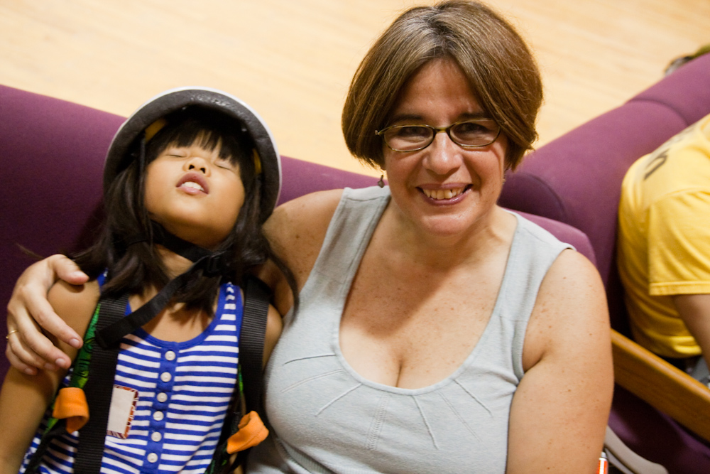 a smiling woman and  pose for the camera