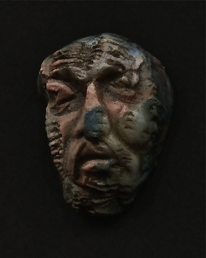 a busturine made from clay with blue and pink highlights