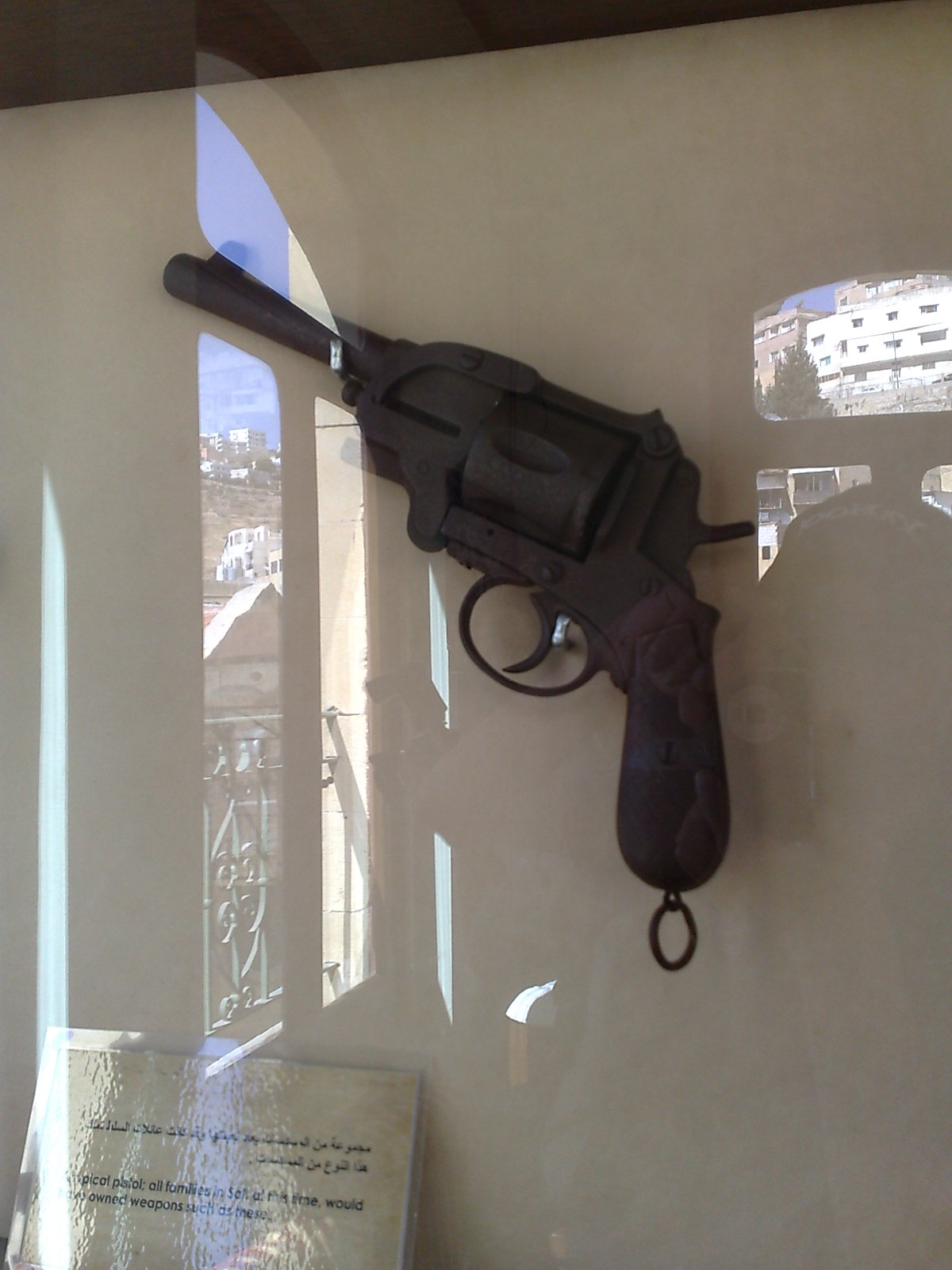 a fake gun is displayed on the wall