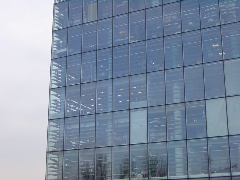 a large building that is being made out of glass