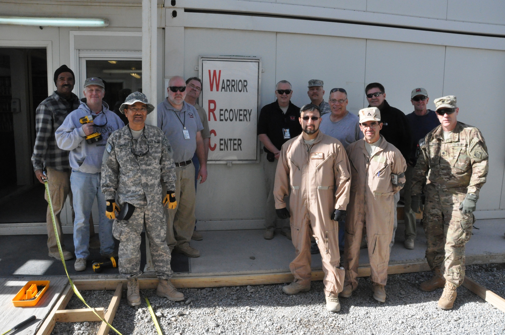 the military is posing for the camera with other men