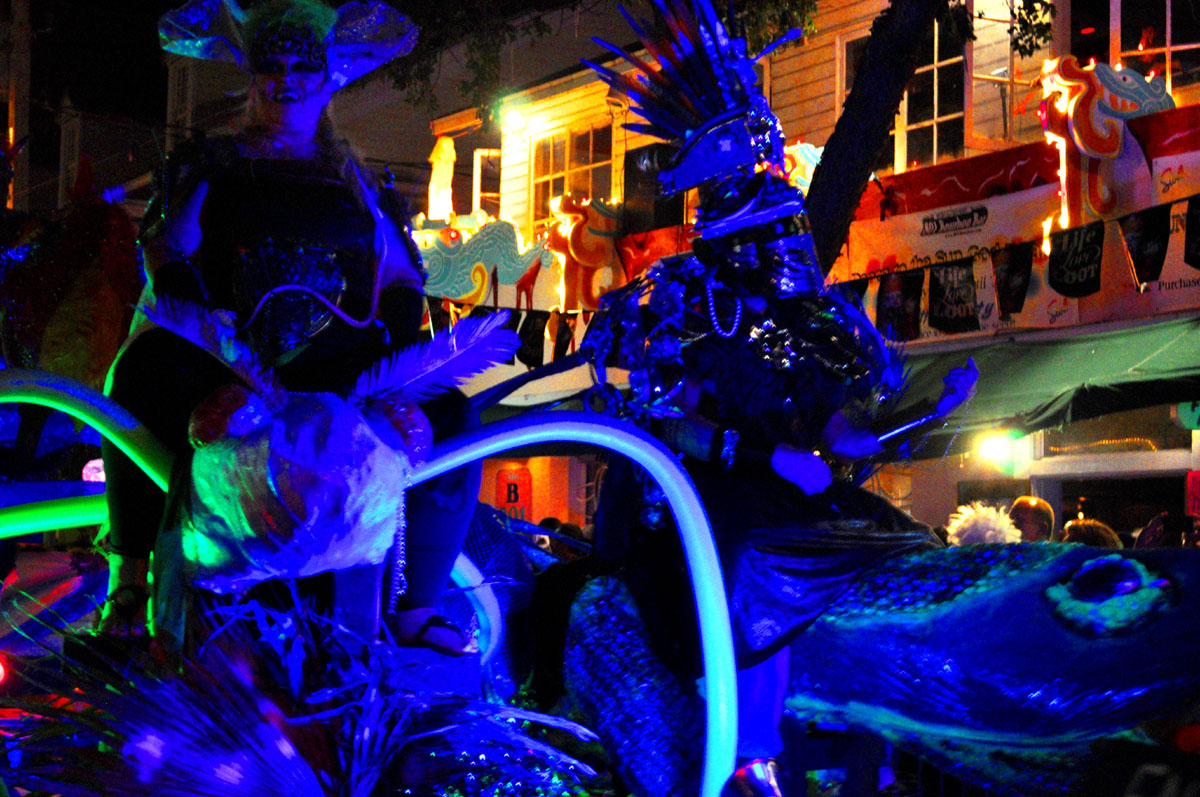 a street light display showing neon colors with dragon figures
