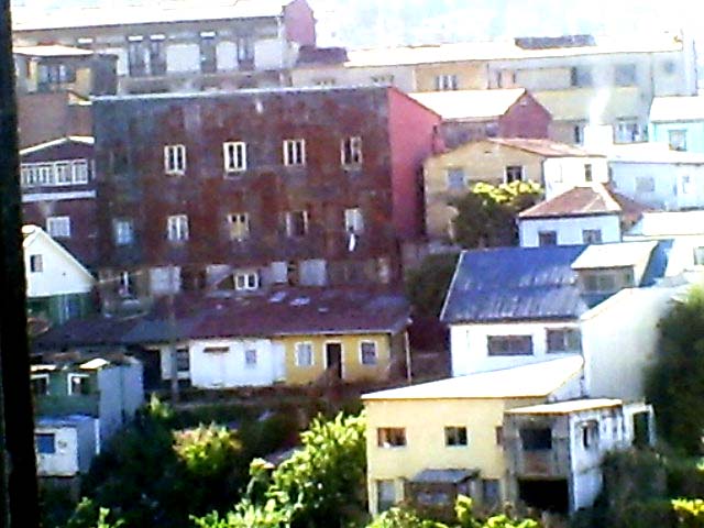 a picture of a residential area with lots of red brick buildings