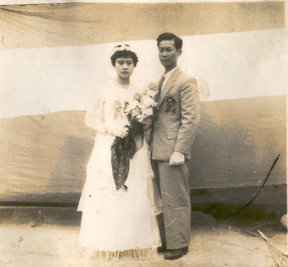 a man and woman posing for a po