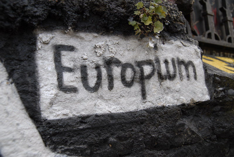 graffiti on concrete reading'europeium'and'welcome to germany '