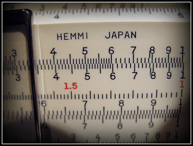 a large square ruler sitting on top of a white surface