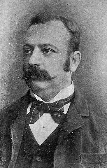 a black and white po of a man with a moustache