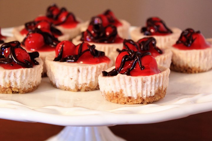 desserts with red and white topping on a white tray