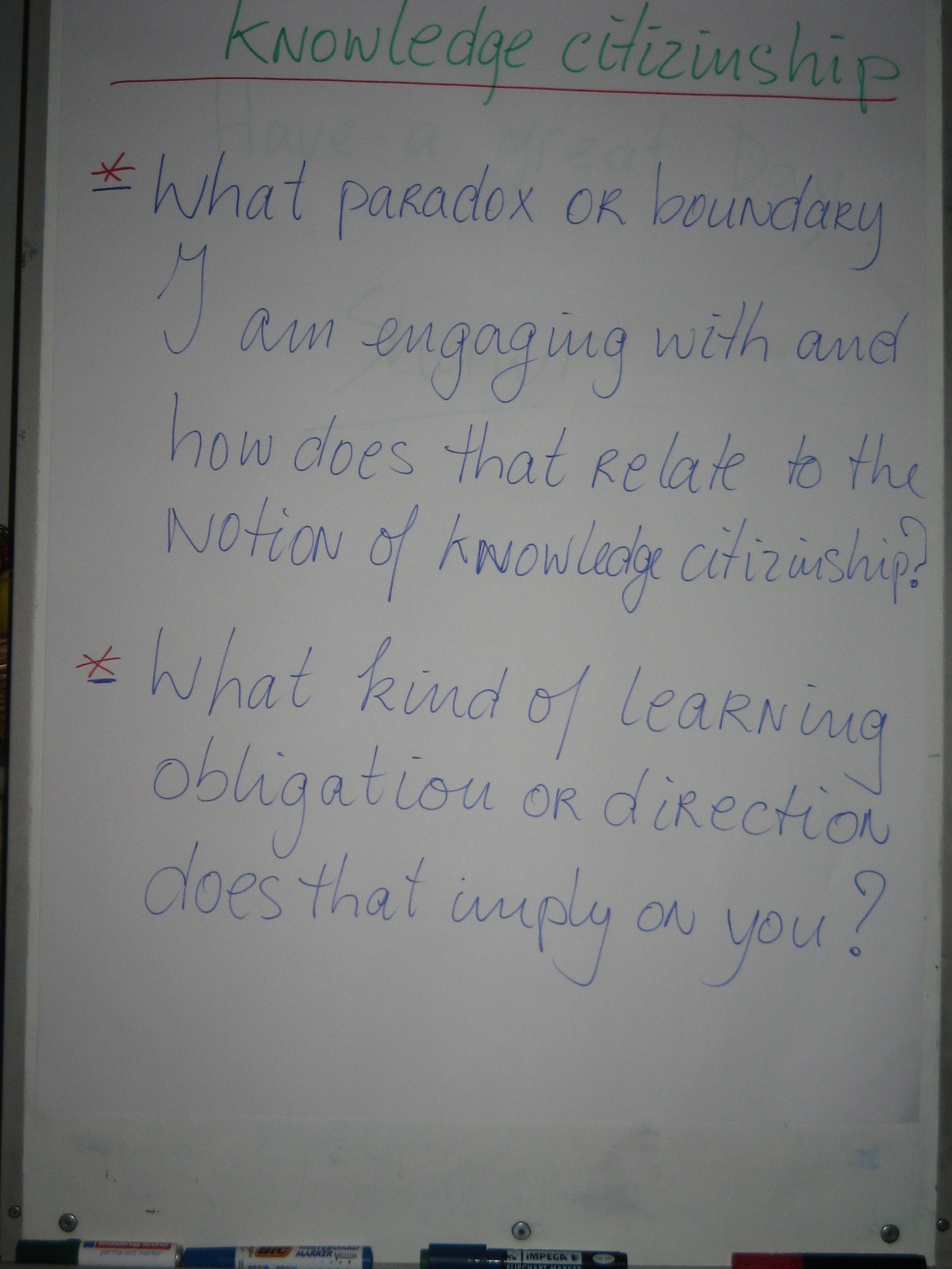 a handwritten note is shown on a large white board