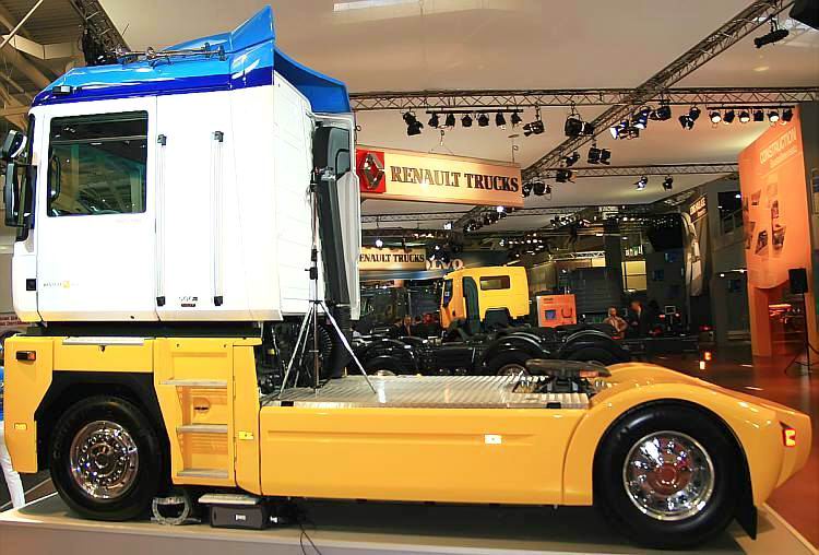 a truck with a trailer at the back on display