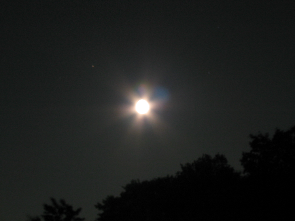 a partial solar eclipse in the dark sky