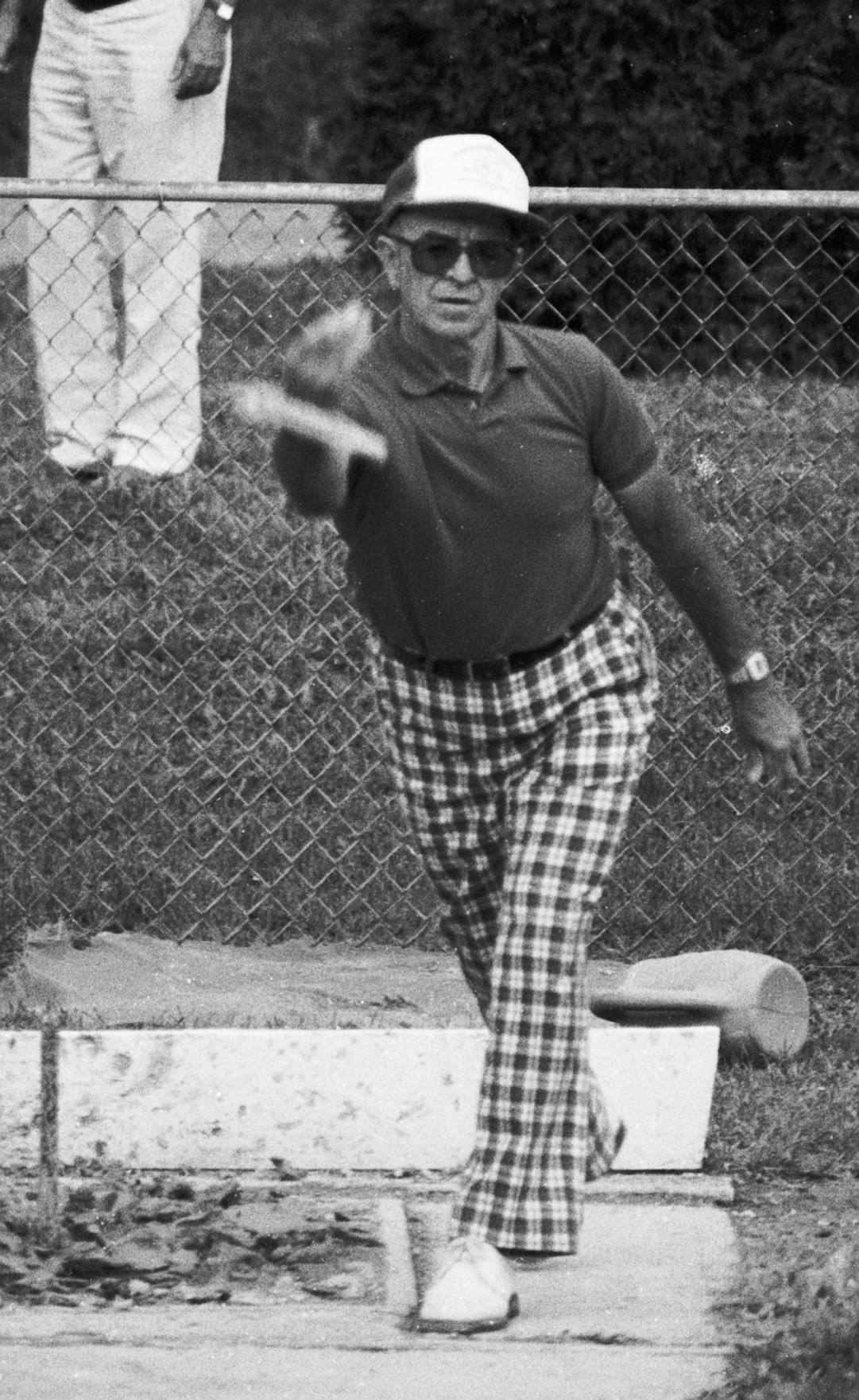 a lady swinging a tennis racket at a ball