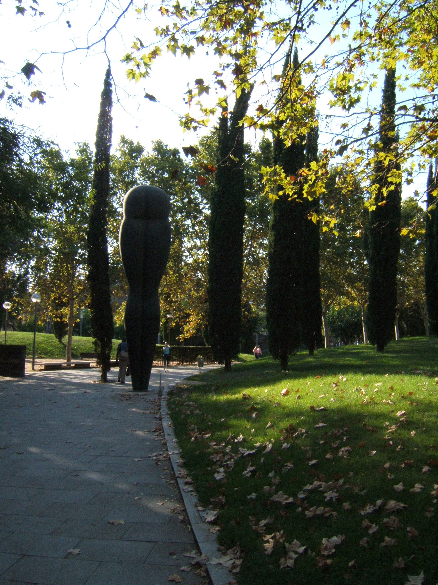 a statue in the park is on the path