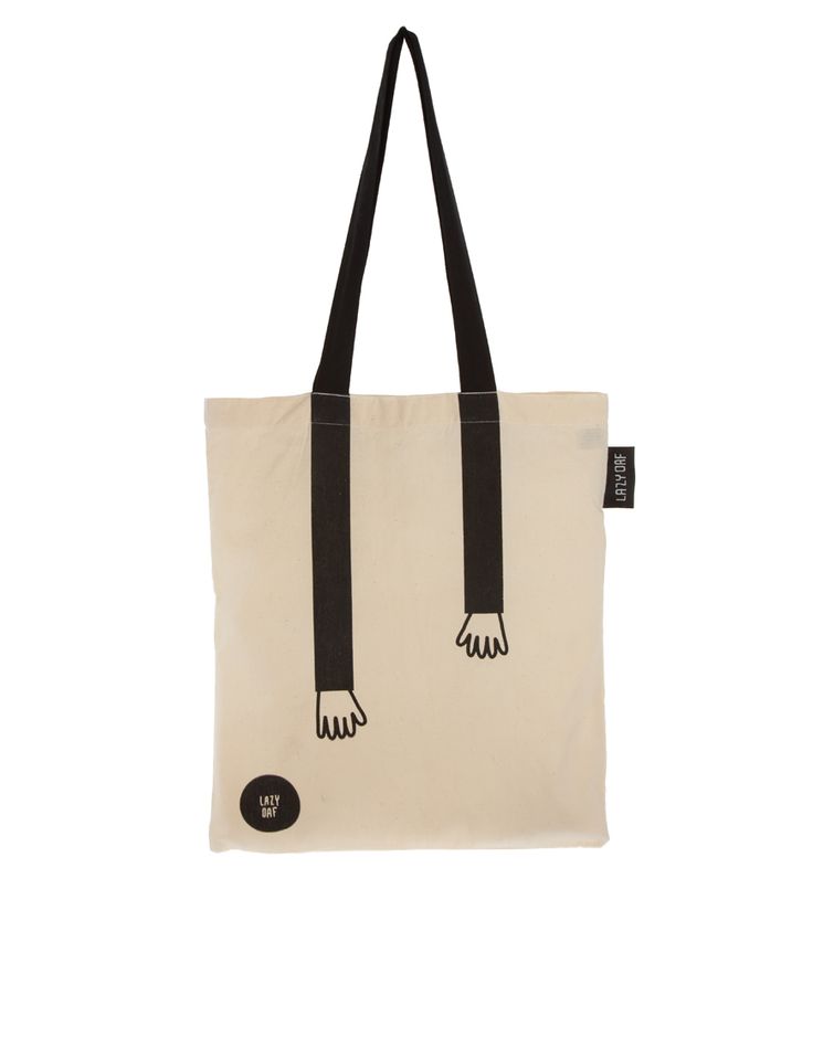 a tote bag that is black and white with a hand design