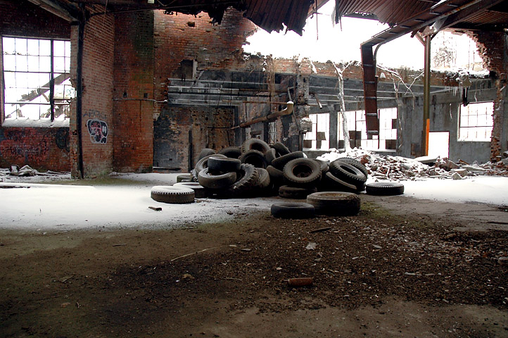 a group of tires in an old building