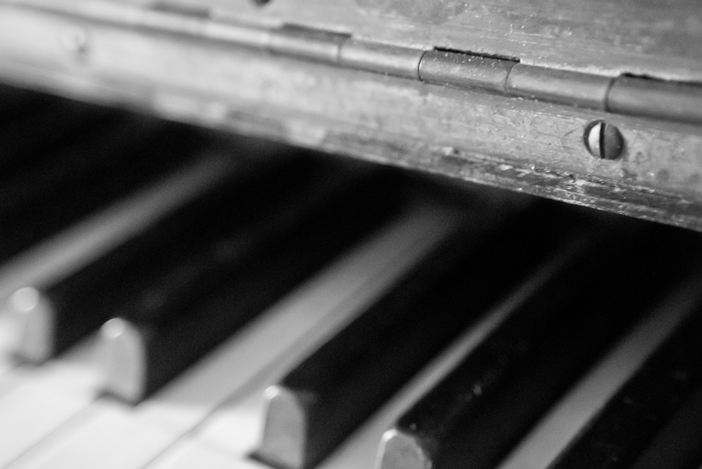 a black and white po of the keys on a piano