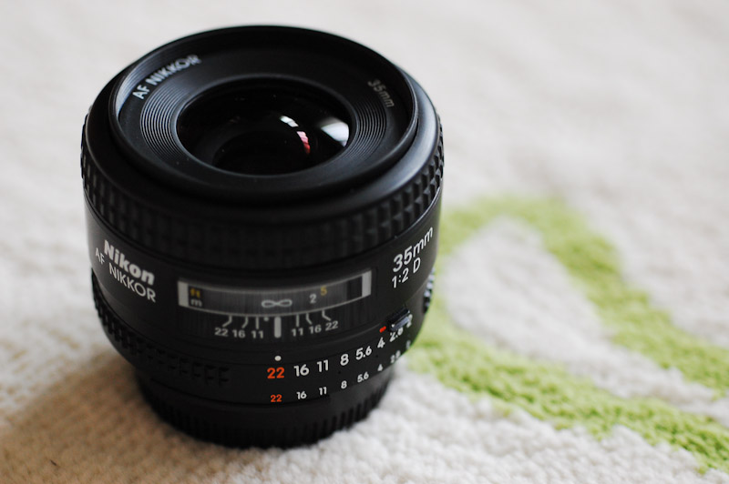 the lens has been placed in front of a rug