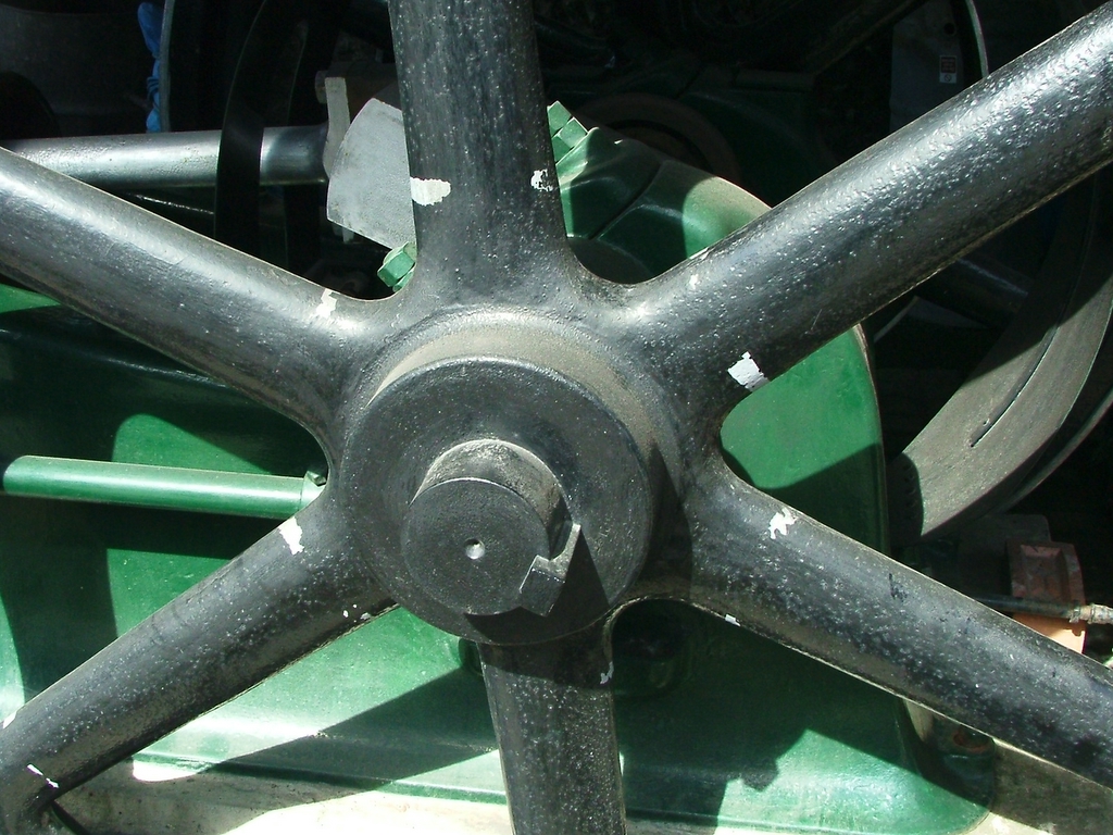 the wheels of a tractor are shown in close up