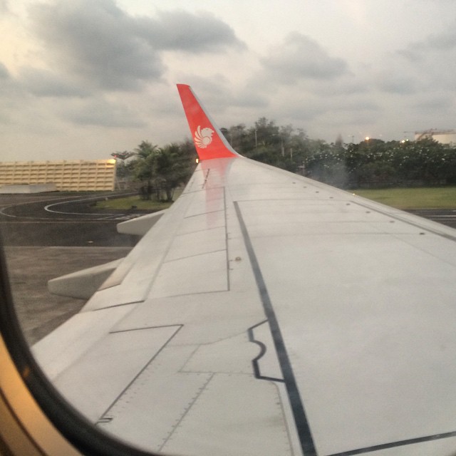 a view of the wing from an airplane