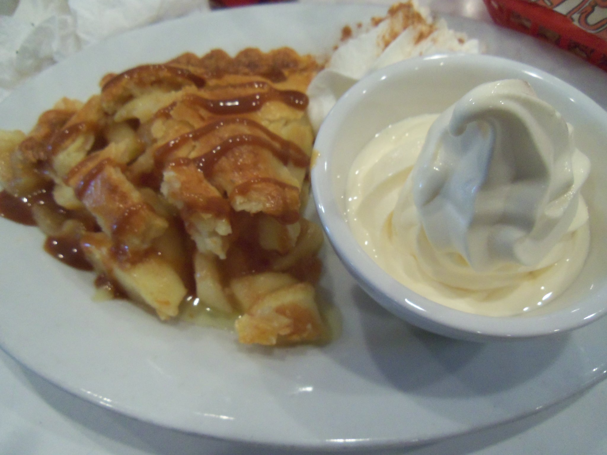 the plate has a bowl of sour cream next to it