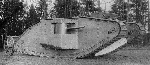 a large tank that is on some grass