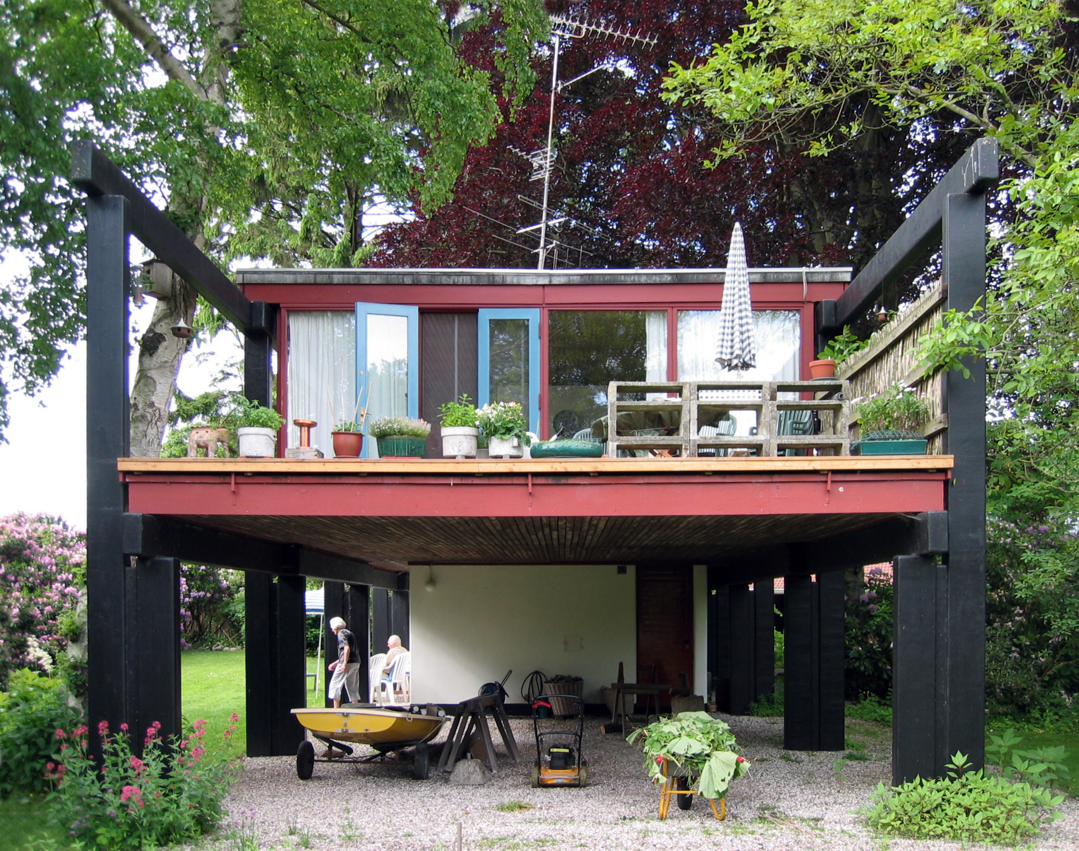 a balcony and patio area inside of a house