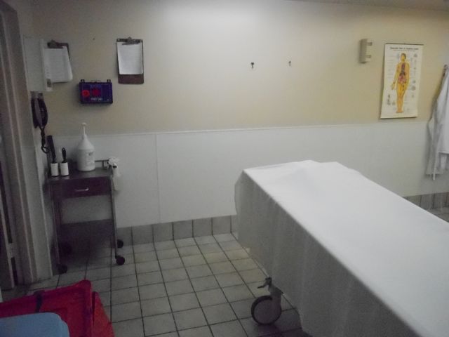 the large table is in a white bathroom