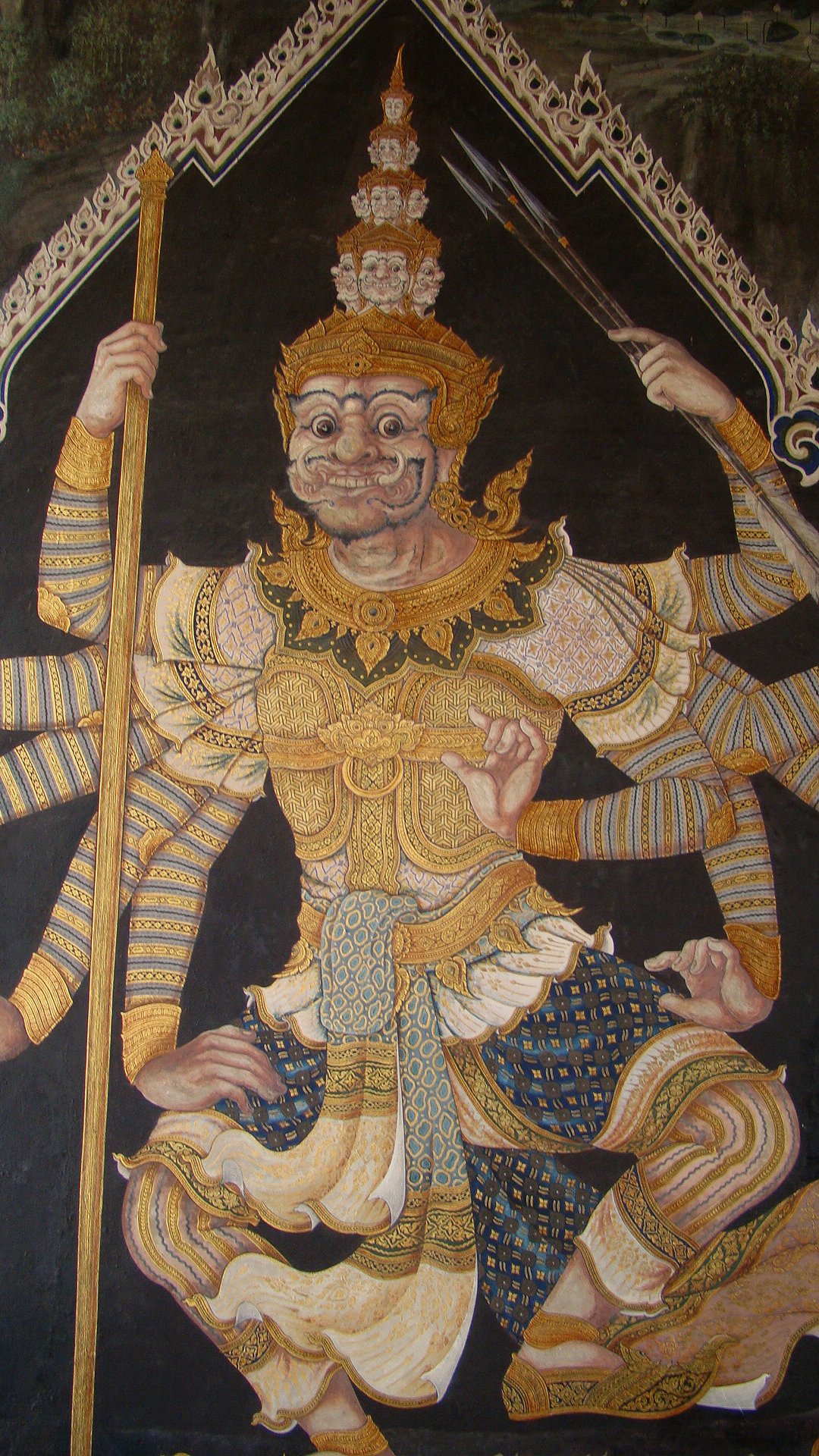 a colorful mural depicting the god with his arms spread in the air