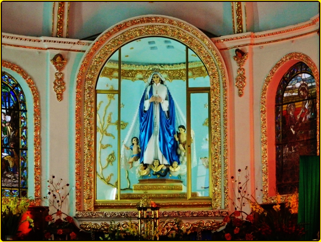the statue of saint mary is placed in a catholic church