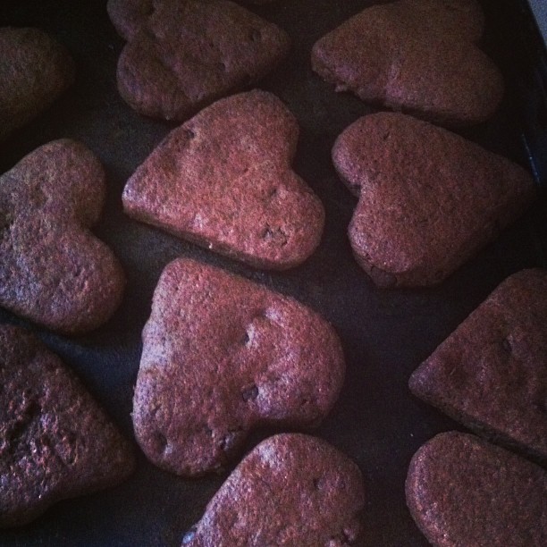 closeup of heart cookies sitting in a tray