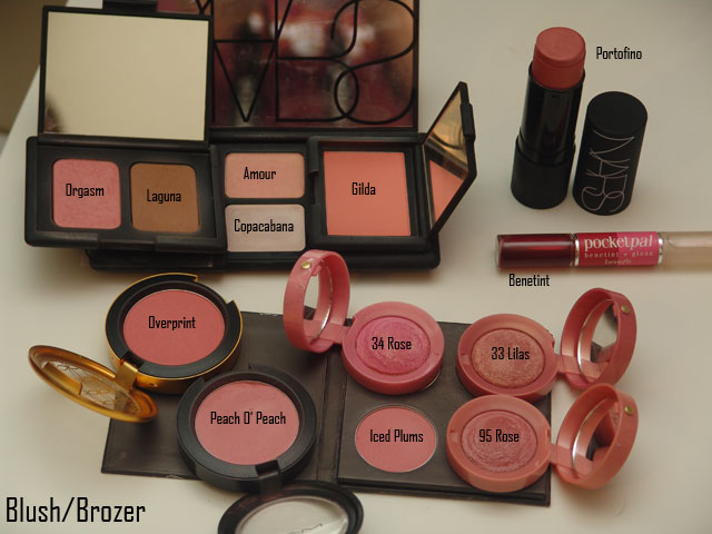 an assortment of makeup products including lipstick, eye shadow, eyeshade and eye shadows