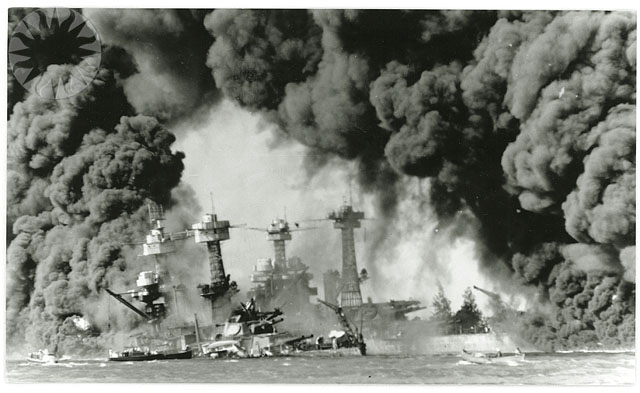 smoke billows out the smokestacks of large ships