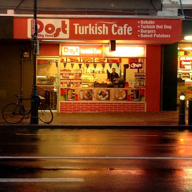 an image of an outside restaurant in the dark