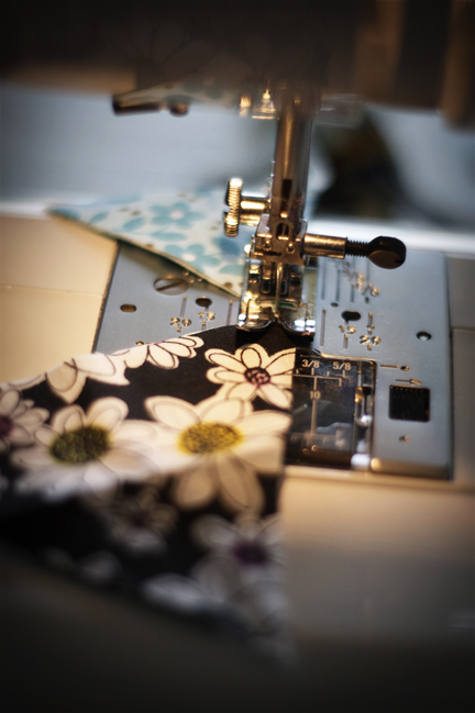 a sewing machine that is in use on fabric