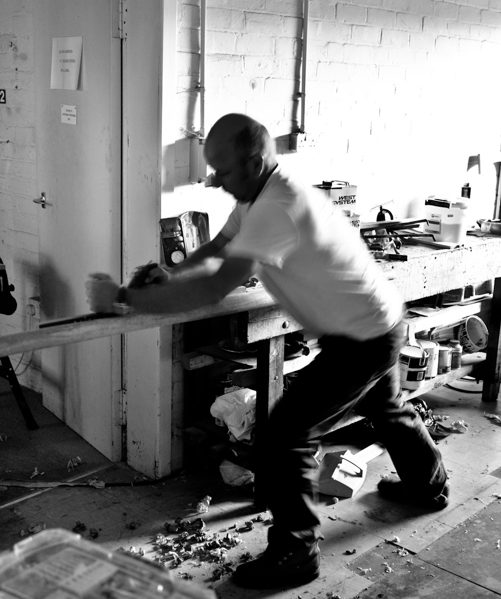 a man in a room filled with lots of debris