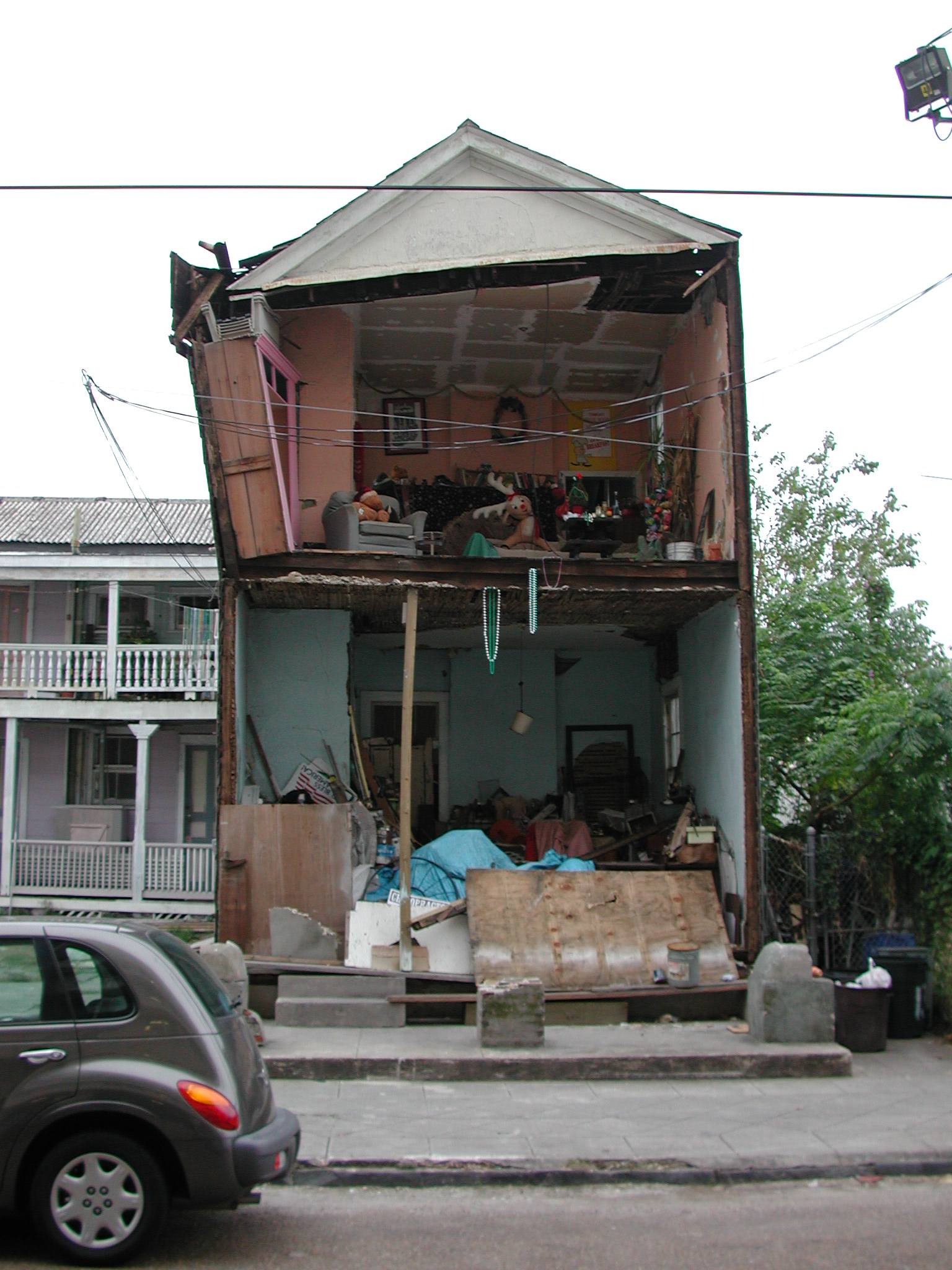 a large home sitting next to a car parked outside