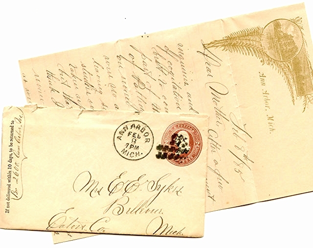 two envelopes with the letter c, and a stamp of an angel on them