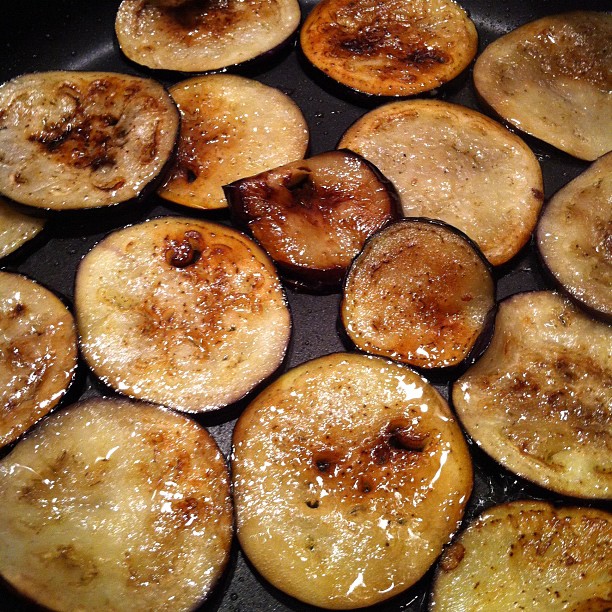 a pan with several fried potatoes sitting in it