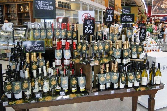 a bunch of bottles sitting on display in a store